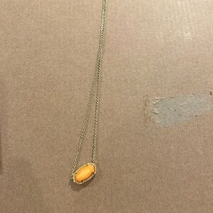 orange kendra scott necklace